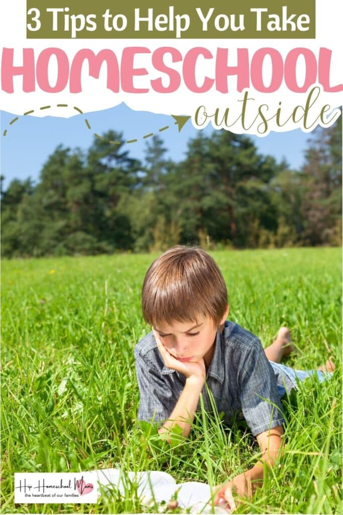 homeschool outside: boy studying out on a field